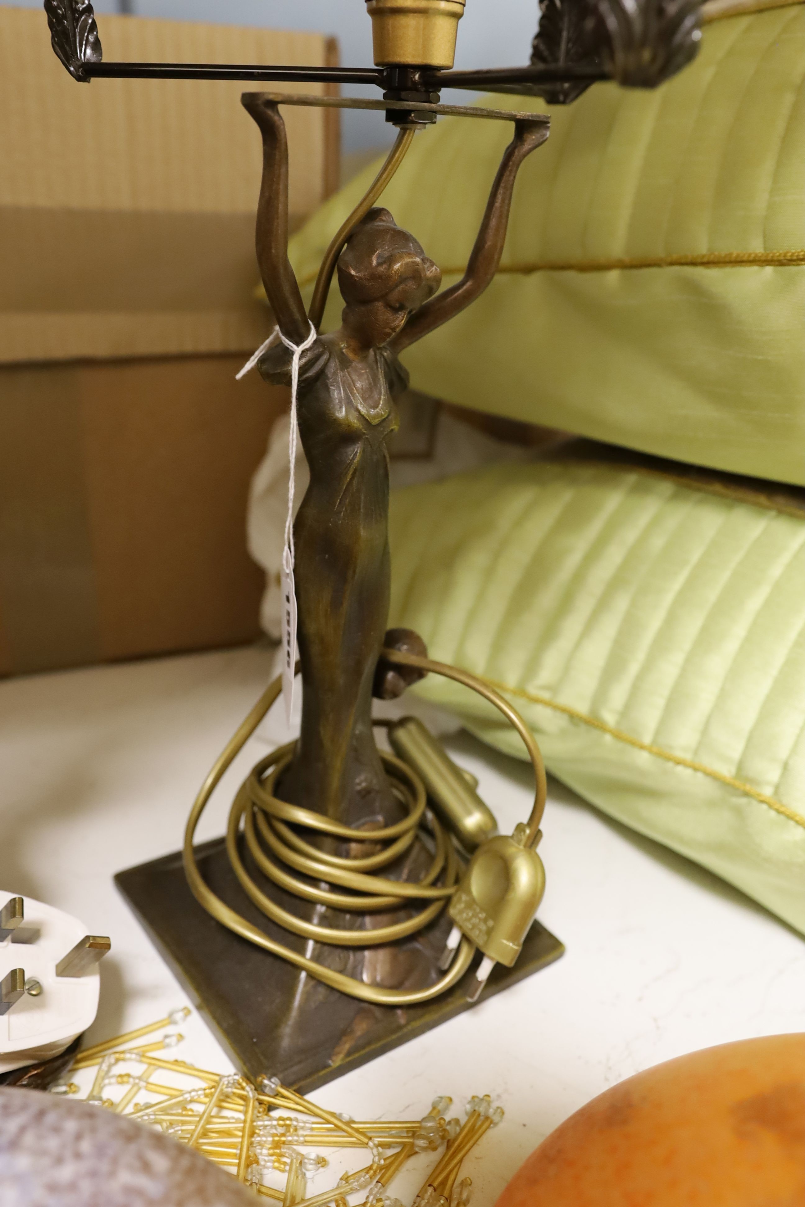 A pair of metal figural table lamps